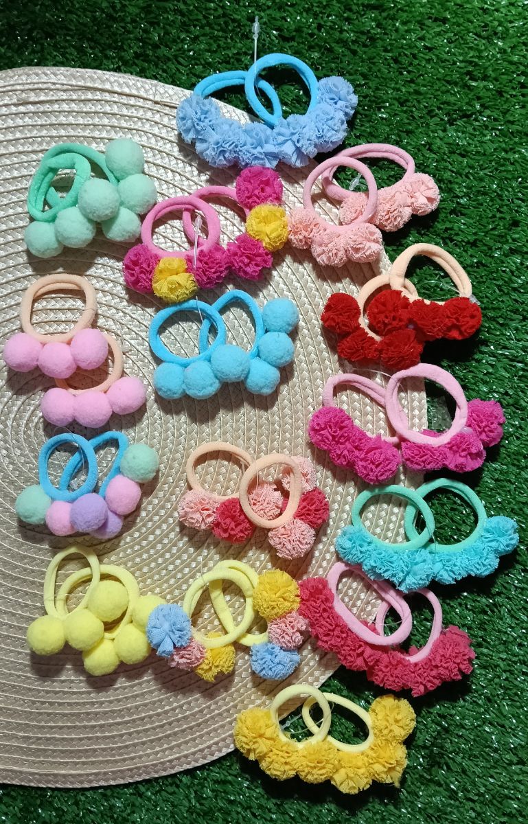 PAR DE XUXAS E HAIR CLIPS